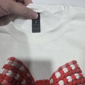 White Sweatshirt with Red Bow Design
